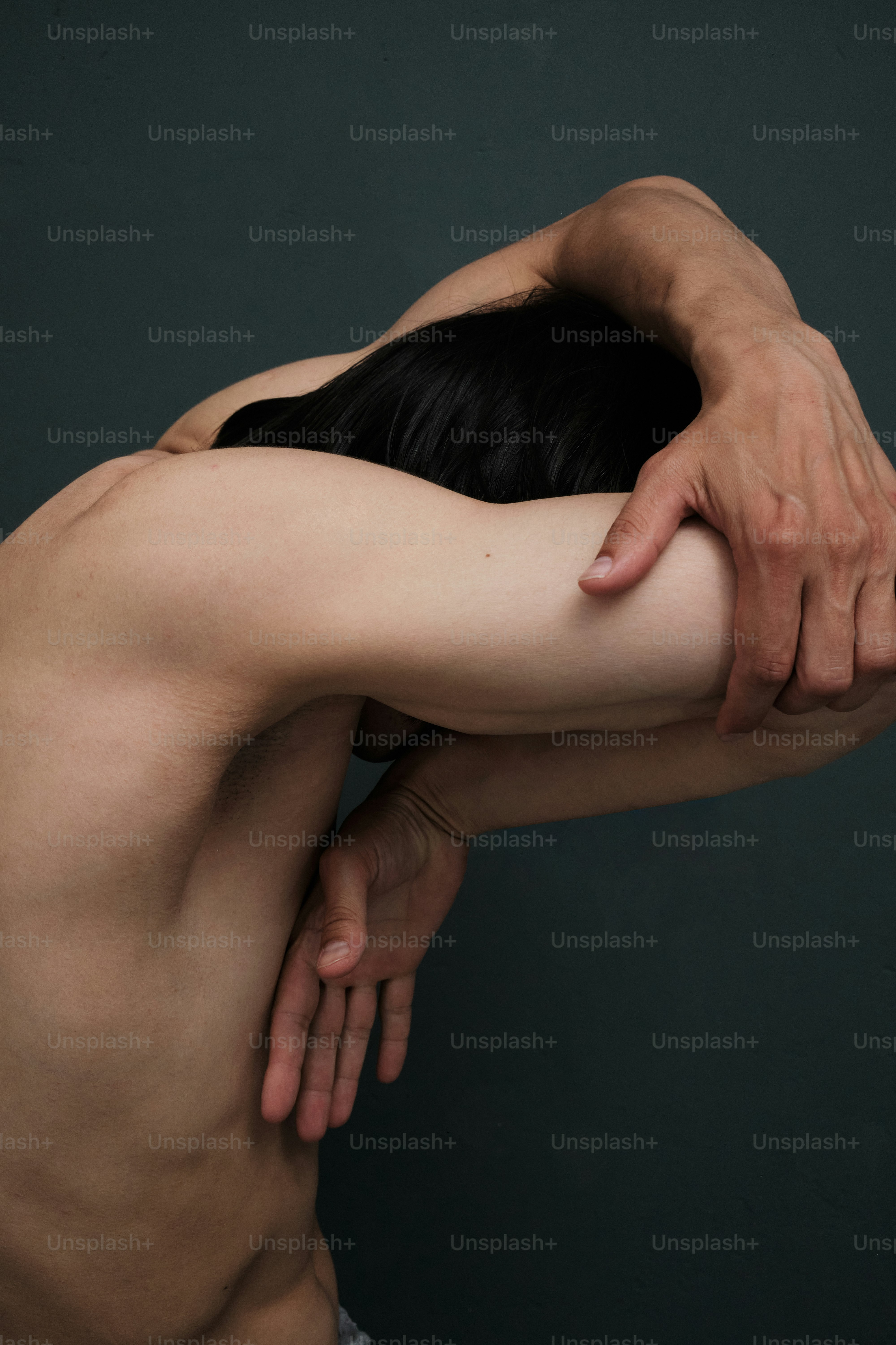 Close-up of hands and body depicting sadness and heartbreak emotions